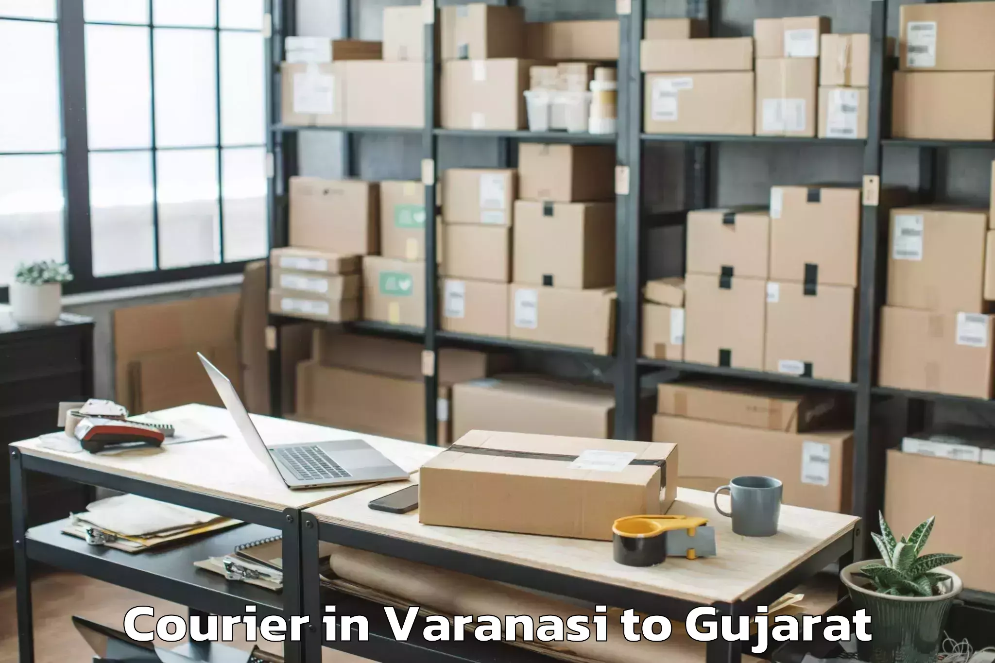 Get Varanasi to Balasinor Courier